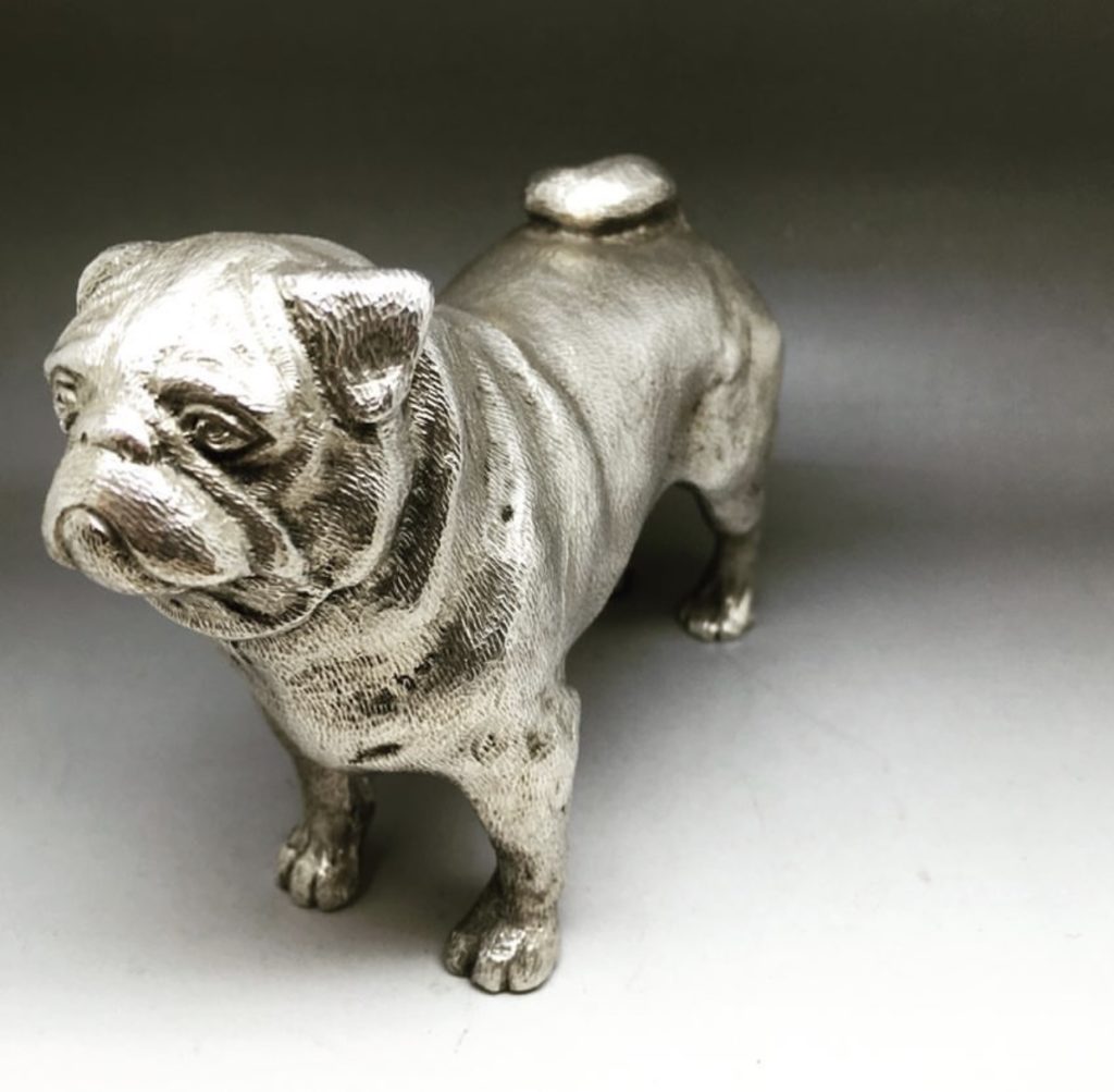 silver pug statue