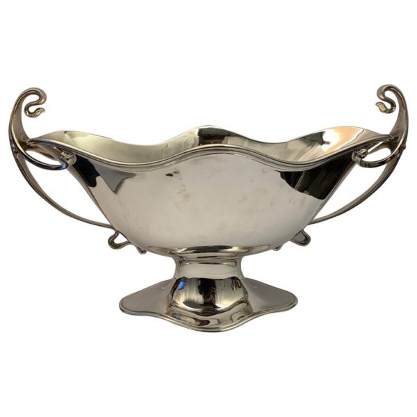 A large and heavy double handled silver centrepiece.