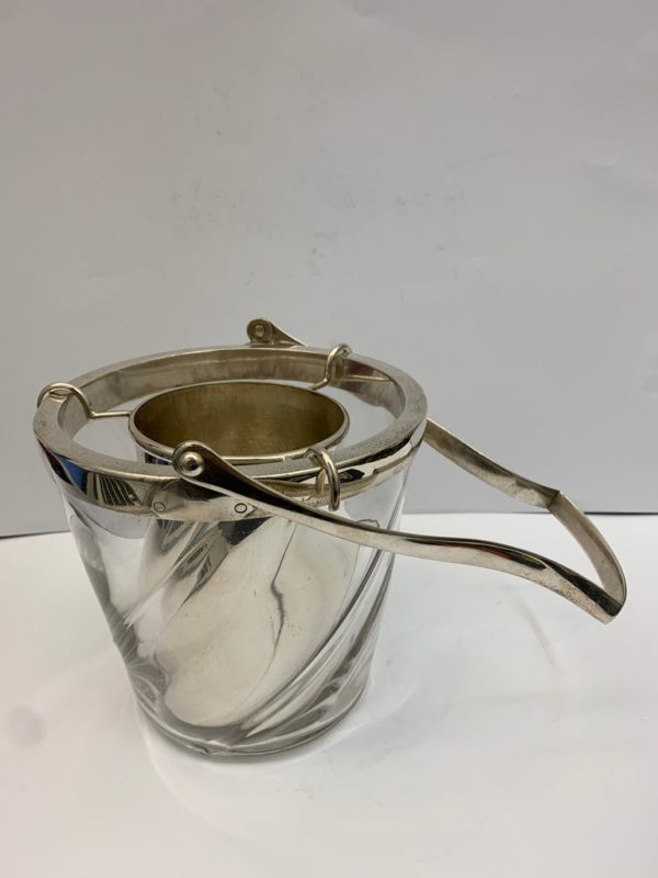 Silver plate ice bucket, circa 1900 with a removable centre and a large long delicate handle.